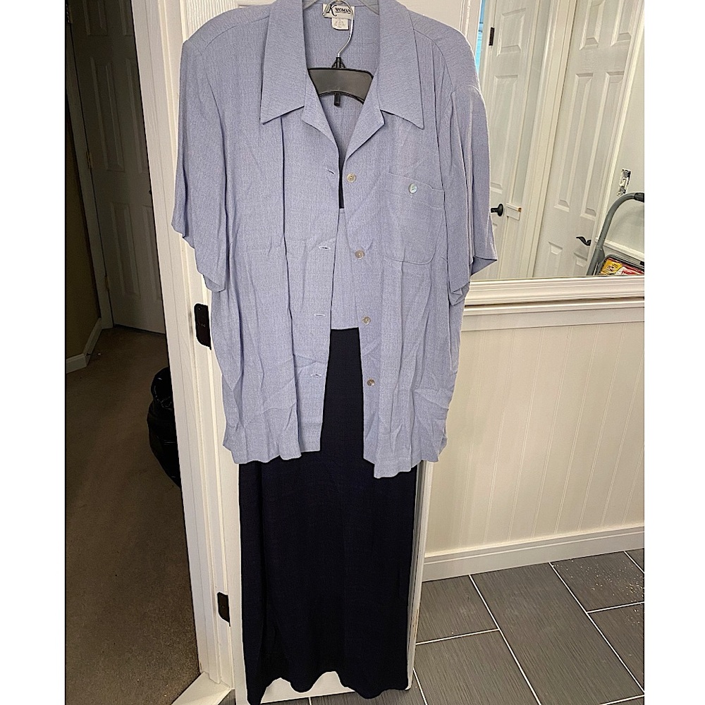 2 piece light blue and black jacket dress with short sleeve jacket.